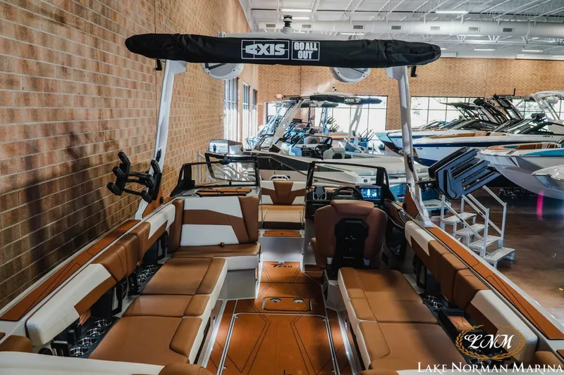 Slide: The Image of 2026 Axis T250 boat interior at Lake Norman Marina showroom. - 10