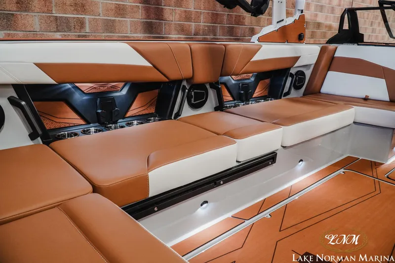 Slide: The Image of Luxurious interior of 2026 Axis T250 boat with brown and white seating. - 20