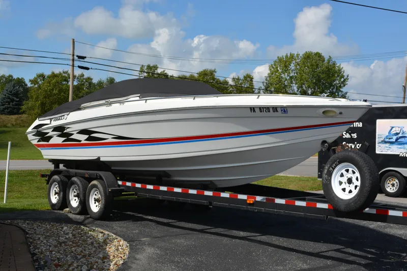 The Image of 2000 Formula 271 FASTech speedboat on trailer, white with red and black accents. - 1