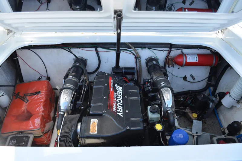 Slide: The Image of Engine compartment of a 2000 Formula 271 FASTech boat with Mercury engine. - 14