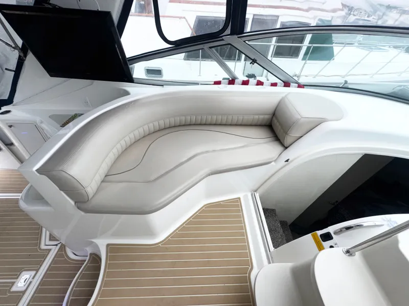 Slide: The Image of Luxurious interior seating of 1998 Cruisers Yachts 3870 Esprit with elegant design. - 8