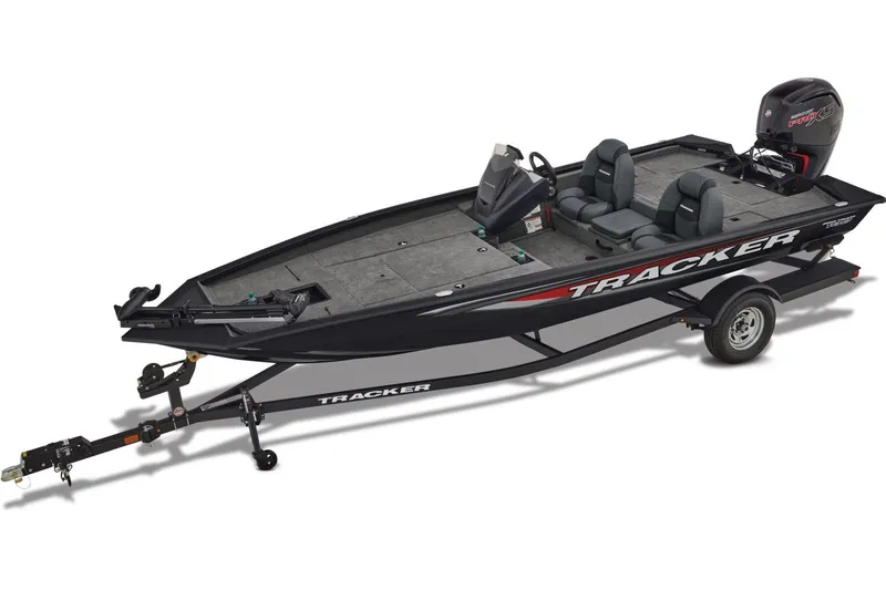 Slide: The Image of Interior of 2026 Tracker Pro Team 190 boat with steering wheel and seating. - 3