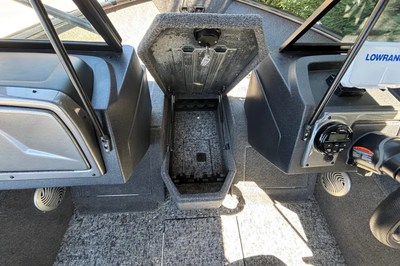 Slide: The Image of 2026 Tracker Pro Guide V-175 WT boat interior with open storage compartment. - 21