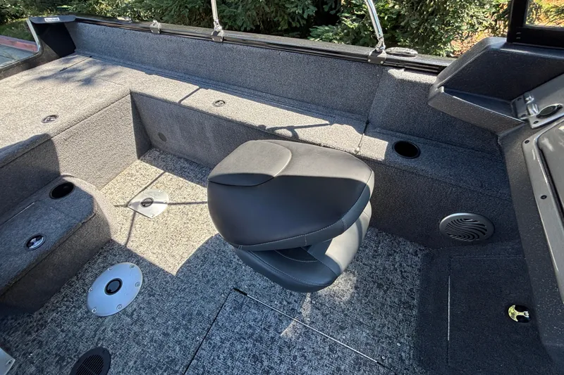 Slide: The Image of 2026 Tracker Pro Guide V-175 WT boat interior with seating and storage compartments. - 42
