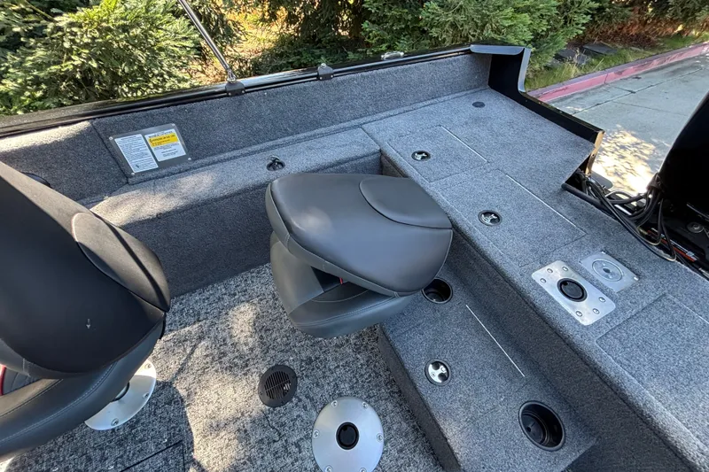 Slide: The Image of 2026 Tracker Pro Guide V-175 WT boat interior with seating and storage compartments. - 32
