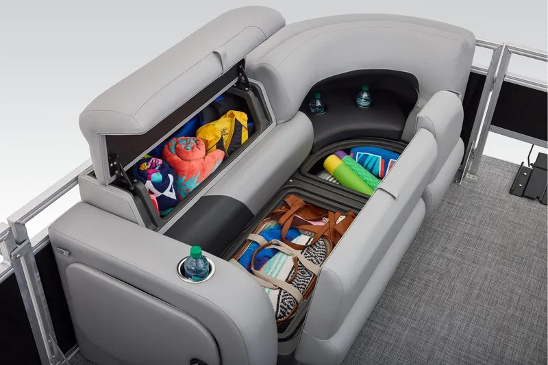 Slide: The Image of 2026 Sun Tracker SportFish 22 DLX storage compartment, open and empty. - 29