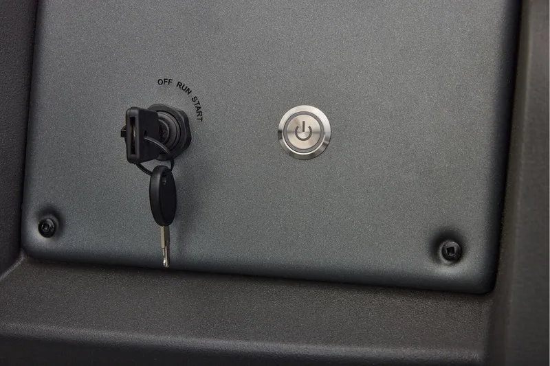 Slide: The Image of Storage compartment of 2026 Sun Tracker SportFish 22 DLX boat, open and empty. - 40