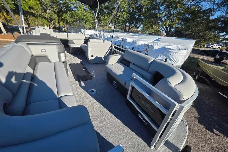 Slide: The Image of 2026 Sun Tracker SportFish 22 XP3 pontoon boat with spacious seating and modern design. - 3