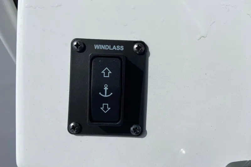 Slide: The Image of Windlass control switch on 2026 Sportsman Open 262 Center Console boat. - 32