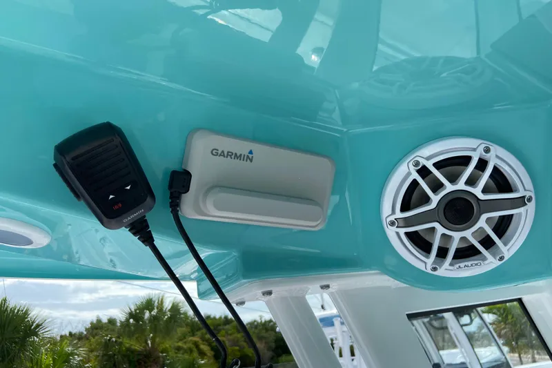Slide: The Image of 2026 Sportsman Open 262 Center Console with Garmin device and JL Audio speaker. - 33
