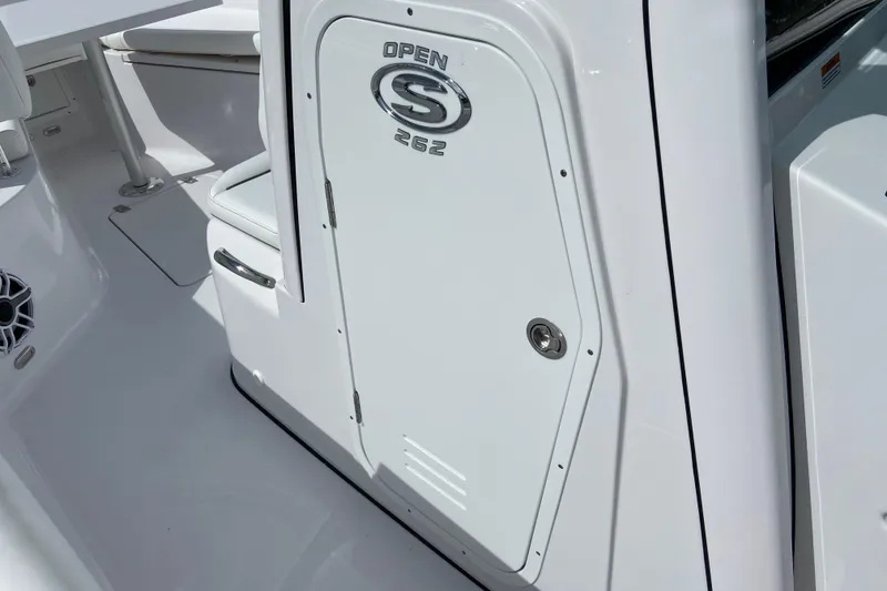 Slide: The Image of 2026 Sportsman Open 262 Center Console boat interior with sleek white design. - 49