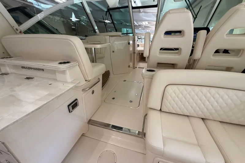 Slide: The Image of Luxurious interior of 2026 Grady-White Freedom 345 boat with plush seating and modern design. - 15