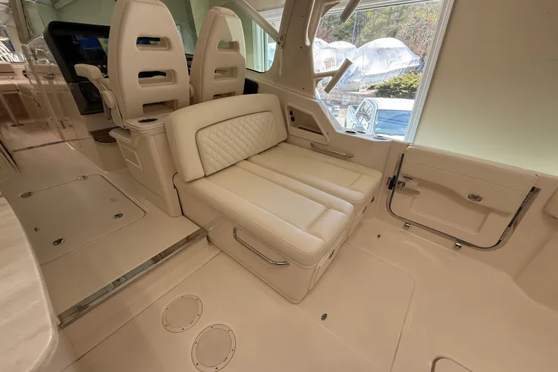Slide: The Image of Luxurious interior of 2026 Grady-White Freedom 345 boat with plush seating and modern design. - 31