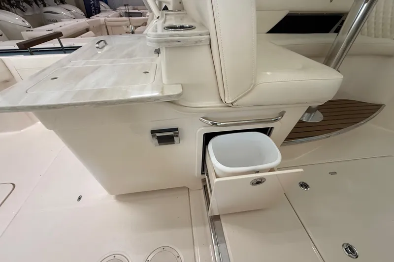 Slide: The Image of Interior of 2026 Grady-White Freedom 345 boat with built-in storage and seating. - 40