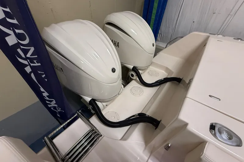 Slide: The Image of 2026 Grady-White Canyon 306 boat with dual Yamaha outboard engines. - 24