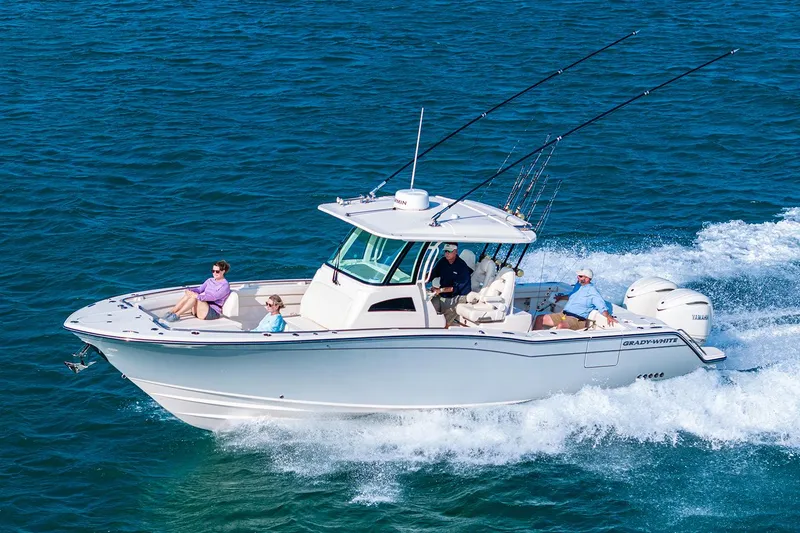 The Image of Manufacturer Provided Image: 2025 Grady-White Canyon 326 boat cruising on open water with passengers. - 0