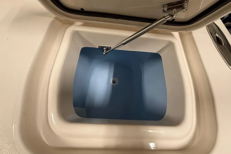 Slide: The Image of Open storage compartment on 2026 Grady-White Canyon 326 boat. - 24