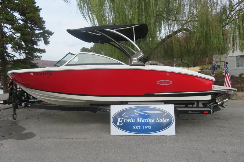 Slide: The Image of 2019 Cobalt CS23 boat in red, displayed at Erwin Marine Sales. - 1