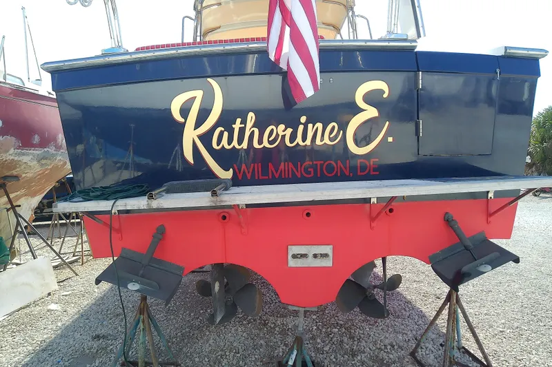 Slide: The Image of 2002 Sabreline 36 Express boat with "Katherine E." name, Wilmington, DE, docked. - 5