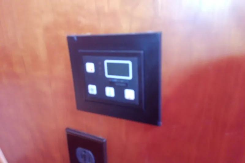 Slide: The Image of Control panel on 2002 Sabreline 36 Express boat interior. - 75