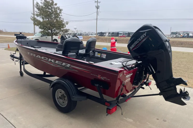 Slide: The Image of 2021 Tracker Pro Guide V-16 SC boat with Mercury engine on trailer. - 3