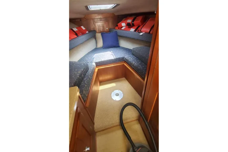 Slide: The Image of Interior cabin of 2006 Albemarle 268 Express Fisherman with seating and life jackets. - 10