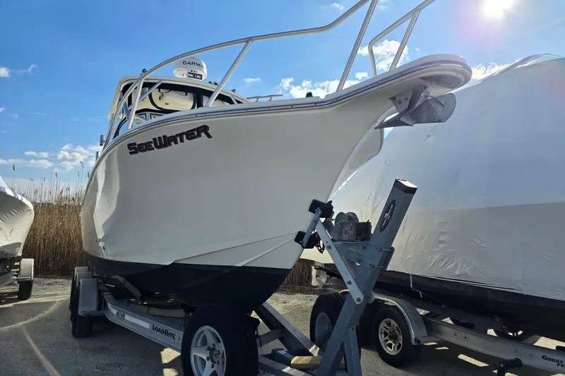 Slide: The Image of 2006 Albemarle 268 Express Fisherman boat on trailer under clear blue sky. - 15