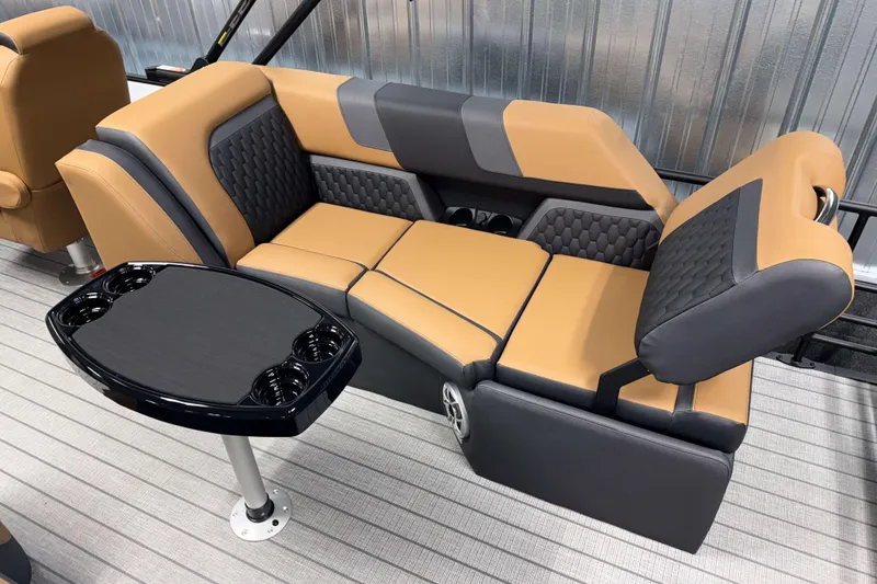 Slide: The Image of Luxurious seating on 2026 Sylvan L3 LZ boat with stylish table and cup holders. - 19