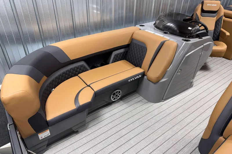 Slide: The Image of 2026 Sylvan L3 LZ pontoon boat interior with tan and gray seating. - 2