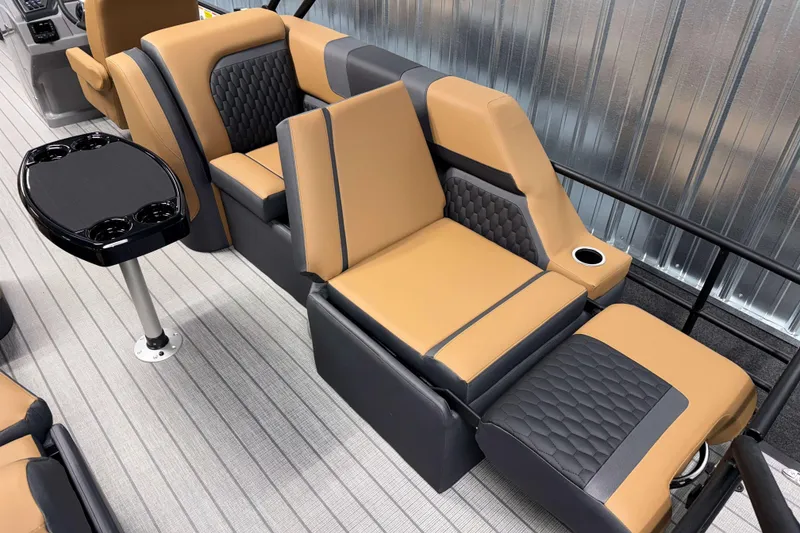 Slide: The Image of Luxurious seating on 2026 Sylvan L3 LZ boat with cup holders and sleek design. - 21