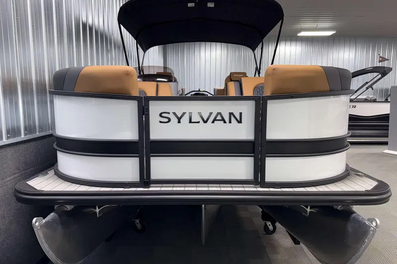 Slide: The Image of 2026 Sylvan L3 LZ pontoon boat with sleek design in showroom. - 24