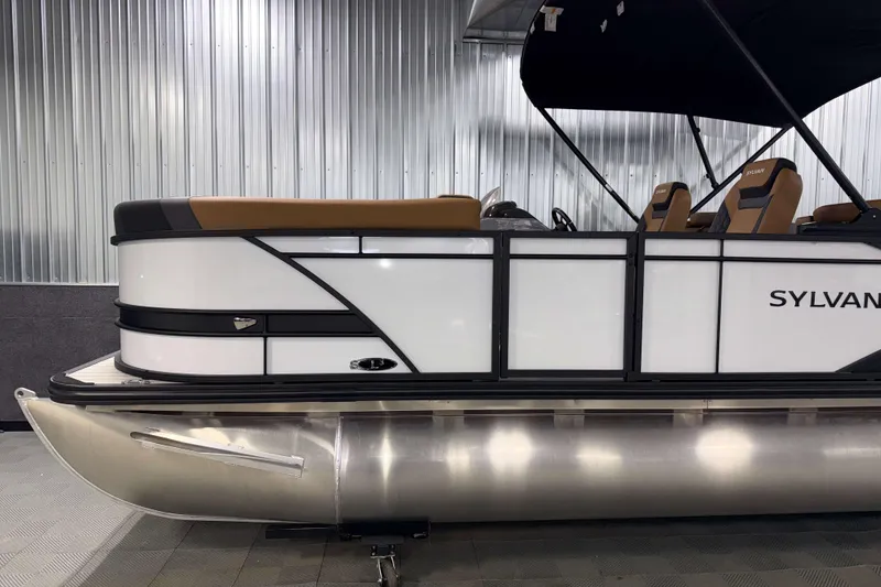 Slide: The Image of 2026 Sylvan L3 LZ pontoon boat with sleek design and comfortable seating. - 27
