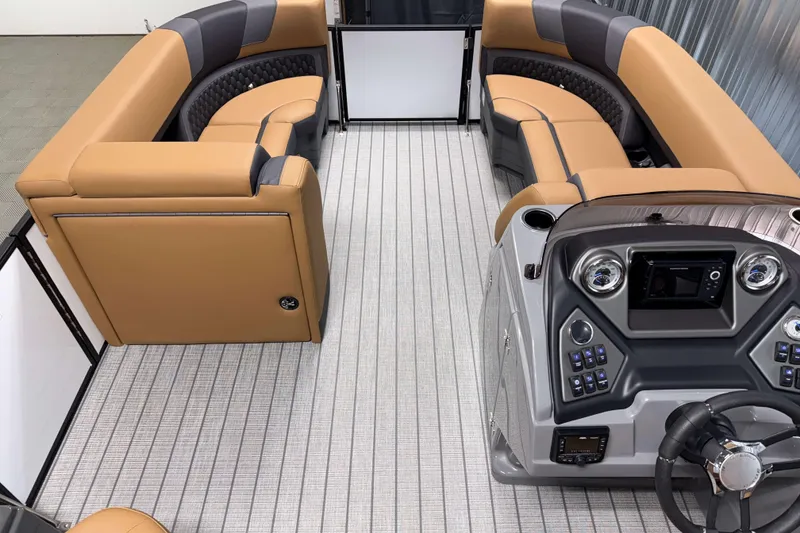 Slide: The Image of Luxurious interior of 2026 Sylvan L3 LZ pontoon boat with plush seating and modern dashboard. - 5