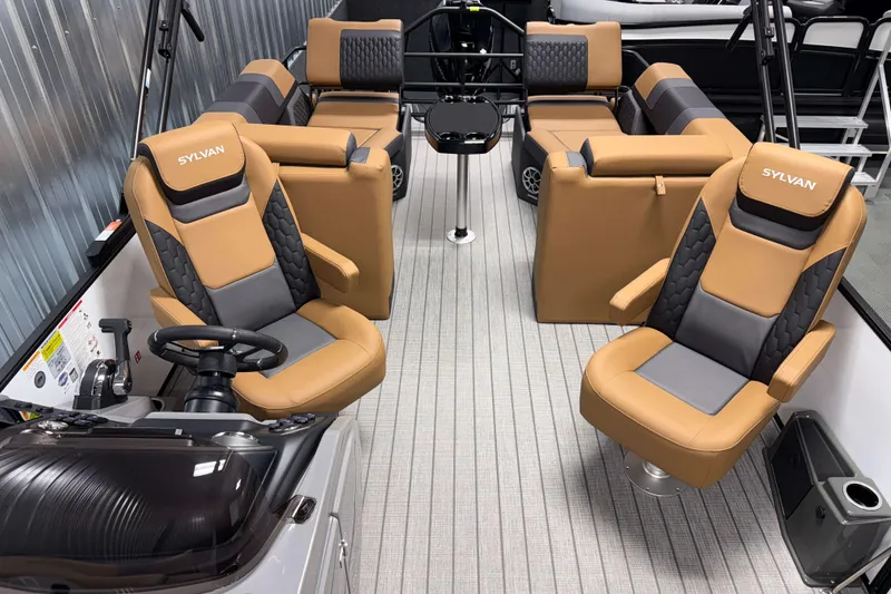 Slide: The Image of 2026 Sylvan L3 LZ boat interior with luxurious tan and gray seating. - 7