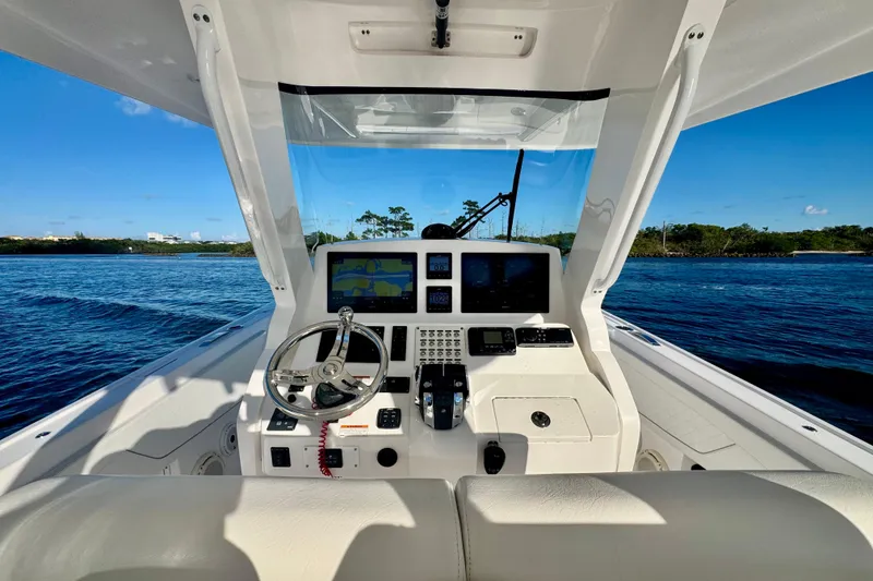 Slide: The Image of Cockpit view of 2020 Intrepid 375 Nomad SE boat on a sunny day. - 25