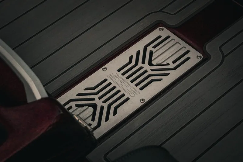 Slide: The Image of 2026 Bass Cat Lynx STS boat floor detail with sleek metal design. - 14