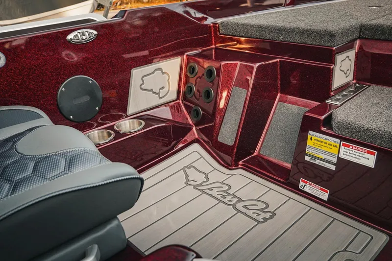 Slide: The Image of 2026 Bass Cat Lynx STS interior with plush seating and sleek design details. - 15
