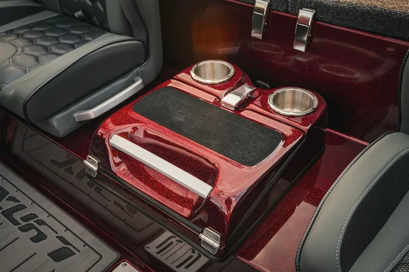 Slide: The Image of 2026 Bass Cat Lynx STS interior with cup holders and sleek seating design. - 16