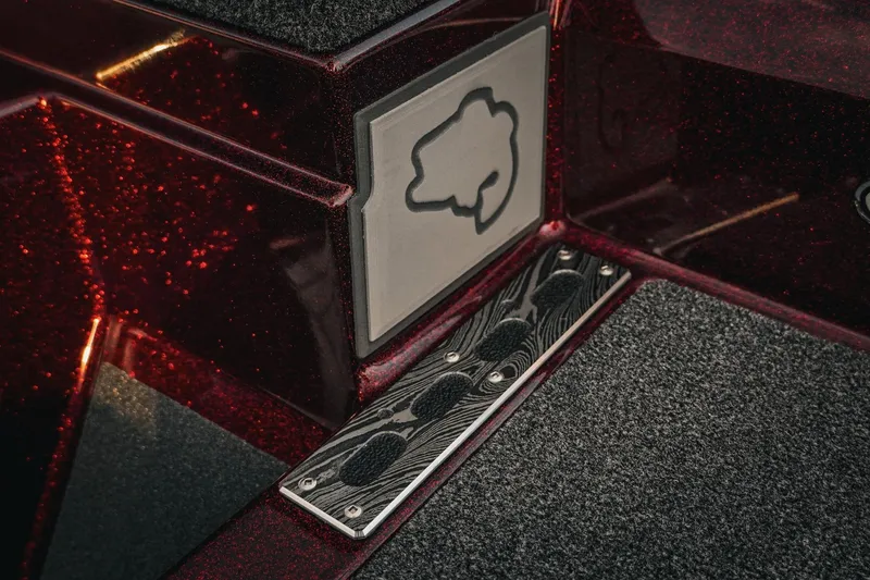 Slide: The Image of 2026 Bass Cat Lynx STS boat detail with textured flooring and logo. - 18
