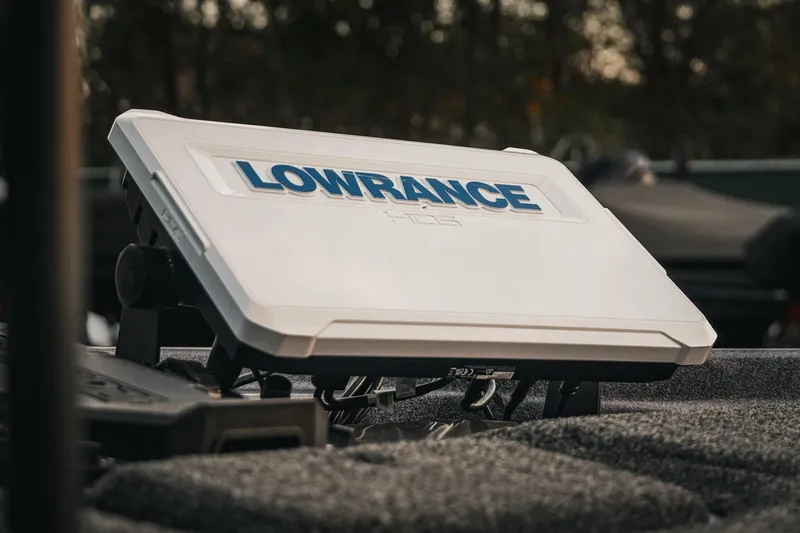 Slide: The Image of Lowrance HDS unit on 2026 Bass Cat Lynx STS boat, close-up view. - 35
