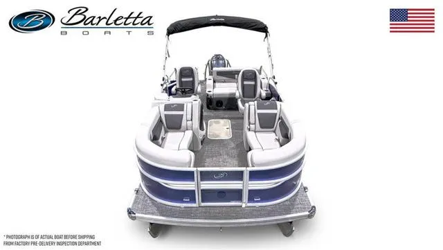 Slide: The Image of 2024 Barletta Cabrio C20UC pontoon boat, front view, sleek design, spacious seating, American flag. - 5
