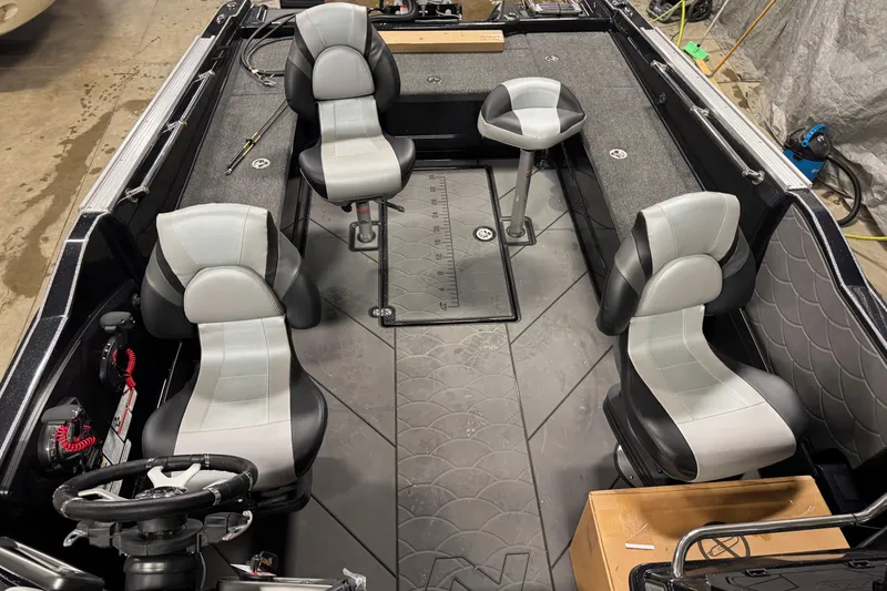 Slide: The Image of Interior of 2026 Nitro ZV21 Pro boat with modern seating and steering wheel. - 12