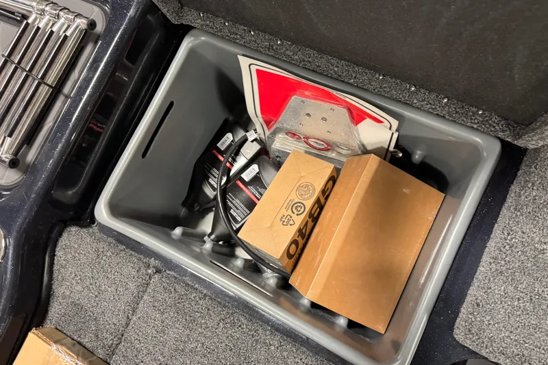 Slide: The Image of Storage compartment in a 2026 Nitro ZV21 Pro, containing boxes and equipment. - 20