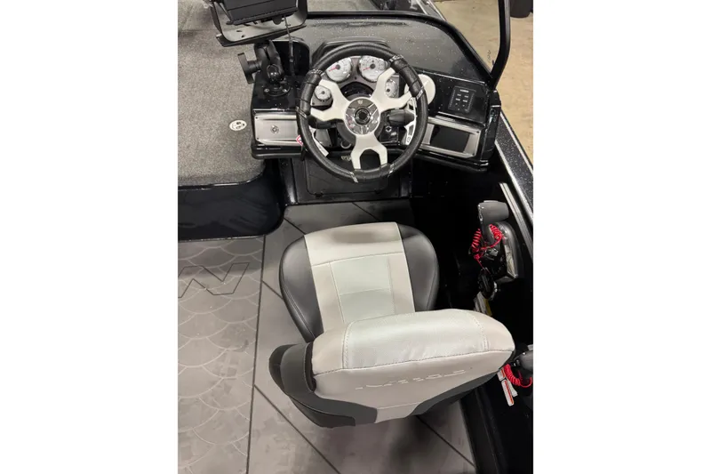 Slide: The Image of 2026 Nitro ZV21 Pro boat cockpit with steering wheel and seat. - 6