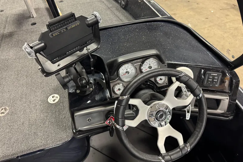 Slide: The Image of Steering console of 2026 Nitro ZV21 Pro boat with gauges and controls. - 7