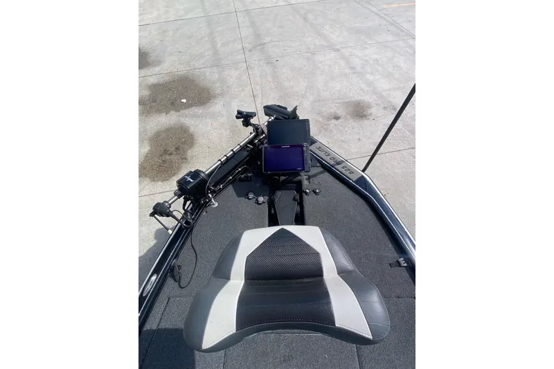 Slide: The Image of 2023 Blazer 625 Pro Elite boat interior with seat and control panel. - 11