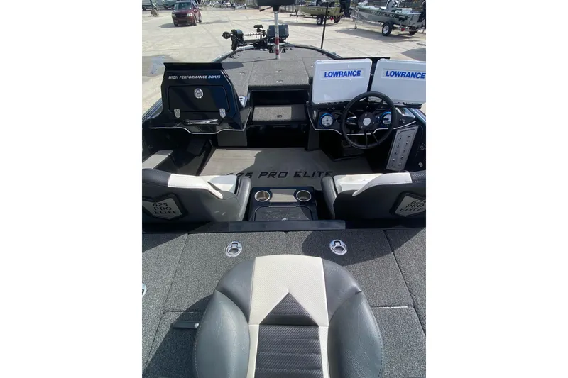 Slide: The Image of 2023 Blazer 625 Pro Elite boat interior with dual Lowrance displays and steering wheel. - 14