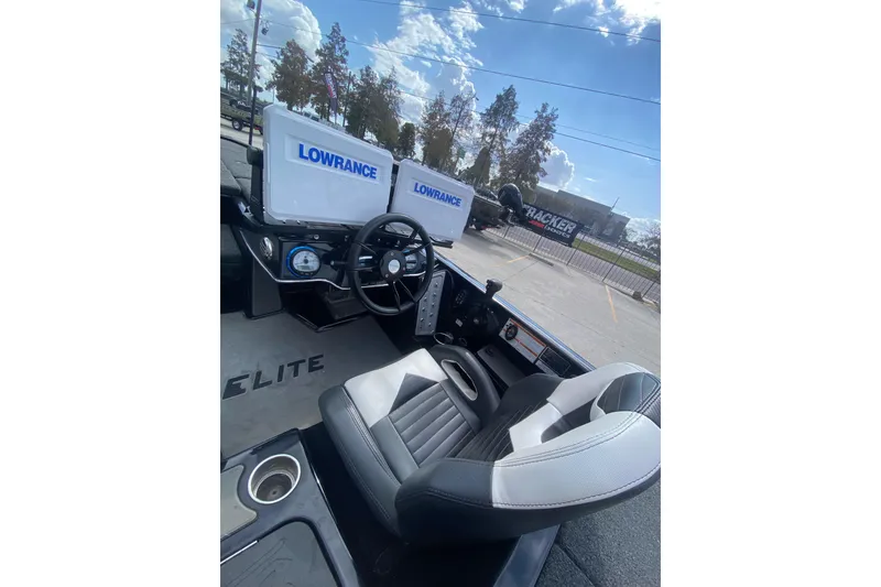 Slide: The Image of 2023 Blazer 625 Pro Elite boat cockpit with Lowrance electronics and comfortable seating. - 17