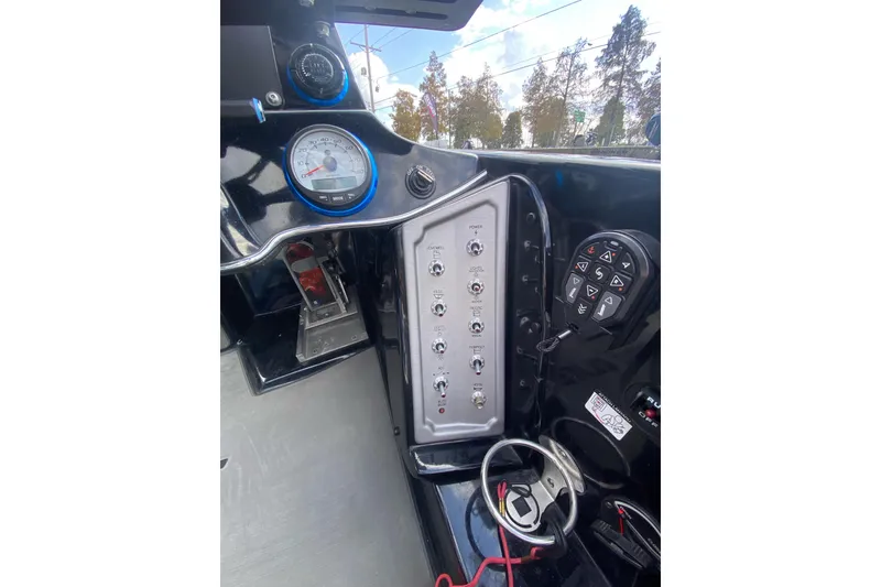 Slide: The Image of 2023 Blazer 625 Pro Elite dashboard with gauges and control panel. - 19