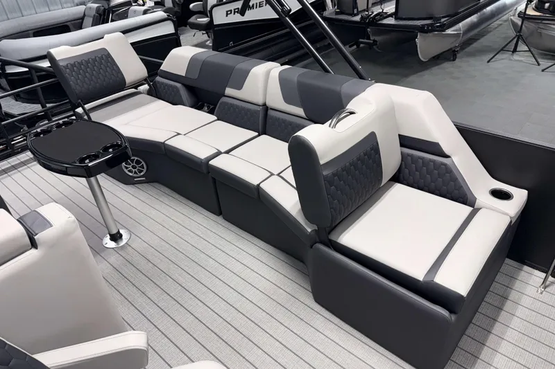 Slide: The Image of Luxurious seating on 2026 Sylvan L3 SLZ pontoon boat with modern design and table. - 14